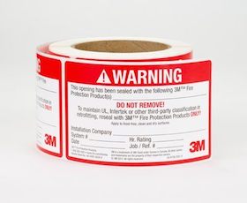 A roll of 3M Firestop Identification WARNING Labels